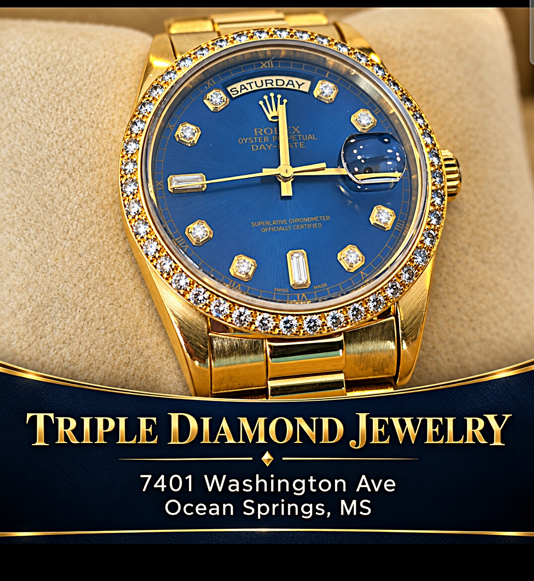 Gold chains, luxury watch, and rings on display at Triple Diamond