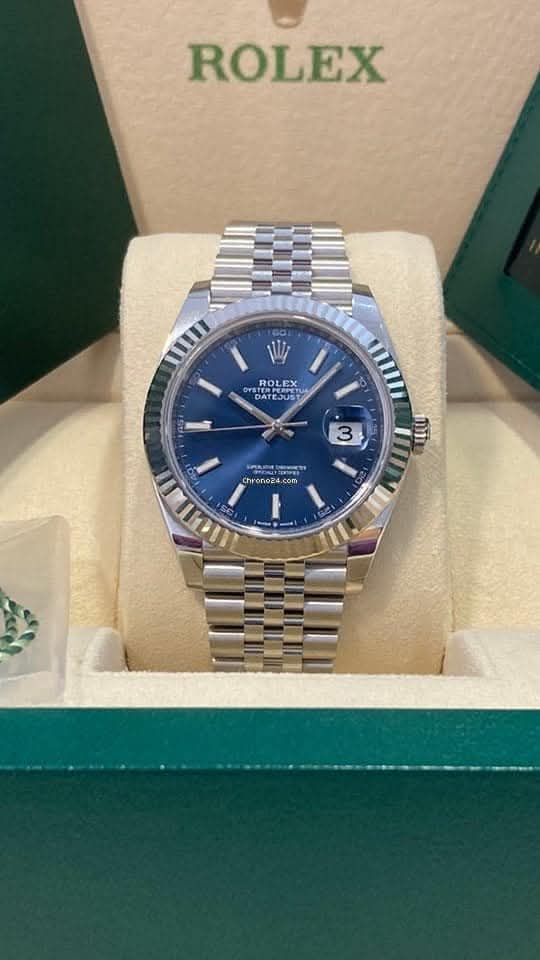 Rolex Day-Date watch with diamond bezel