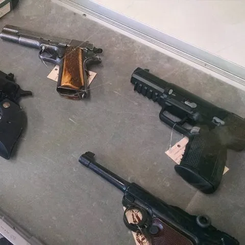 Firearms in the case at Triple Diamond Pawn and Jewelry
